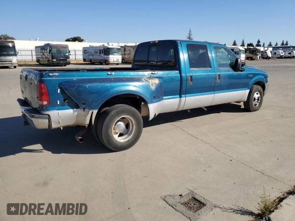 2000 Ford F-350 with VIN 1FTWW32S9YED99031, listed as a Copart auction lot 75952254 with 220,673 mi miles and Salvage title. Bid and sale history available at DreamBid. Image 3.