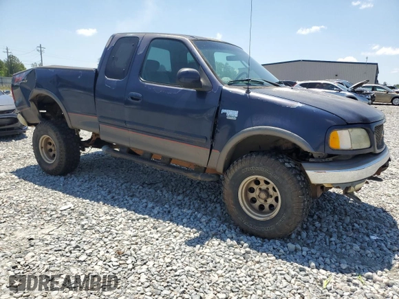 2002 Ford F-150 XL with VIN 1FTRX18L82NB06824, listed as a Copart auction lot 57342315 with 207,390 mi miles and Salvage title. Bid and sale history available at DreamBid. Image 4.