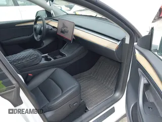 2023 Tesla Model Y Long Range z VIN 7SAYGDEE0PA065534, wystawiony jako IAAI lot #42445868 z przebiegiem 22 638 mil mil oraz . Historia ofert i sprzedaży dostępna na DreamBid. Obrazek 5.