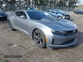 2021 Chevrolet Camaro 1LT with VIN 1G1FB1RX3M0102532, listed as a IAAI auction lot 41550869 with 57,377 mi miles. Bid and sale history available at carsss.com. Image 1.