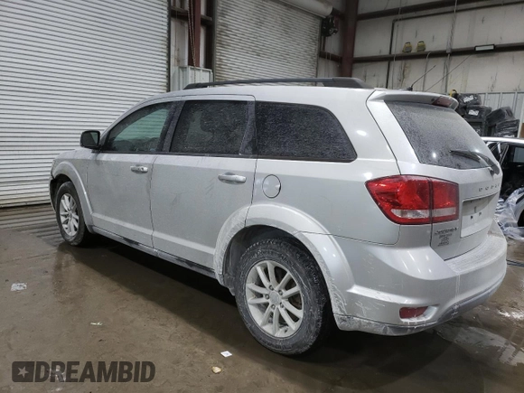 2013 Dodge Journey SXT with VIN 3C4PDCBB1DT558323, listed as a Copart auction lot 45953885 with 165,781 mi miles and Salvage Title. Bid and sale history available at DreamBid. Image 2.