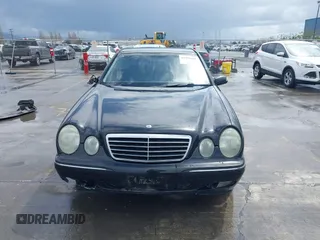 2000 Mercedes-Benz E-Class with VIN WDBJF65JXYA997410, listed as a IAAI auction lot 41939485 with 158,559 mi miles. Bid and sale history available at carsss.com. Image 13.
