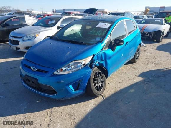 2012 Ford Fiesta SE with VIN 3FADP4EJ6CM131947, listed as a IAAI auction lot 41013636 with 148,195 mi miles. Bid and sale history available at carsss.com. Image 17.