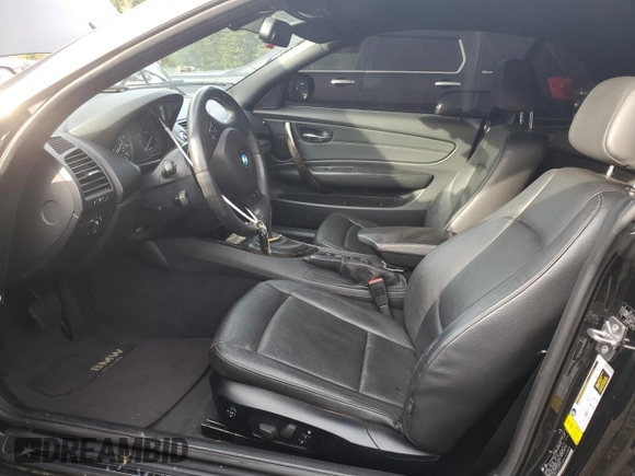 2010 BMW 1 Series 135i with VIN WBAUN9C58AVK41899, listed as a Copart auction lot 80092374 with 81,221 mi miles and Salvage title. Bid and sale history available at DreamBid. Image 7.