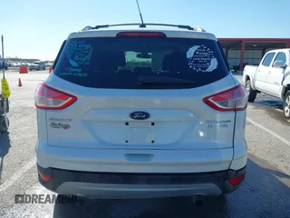 2013 Ford Escape Titanium with VIN 1FMCU0J96DUA71857, listed as a IAAI auction lot 41877003 with 118,864 mi miles and . Bid and sale history available at carsss.com. Image 16.