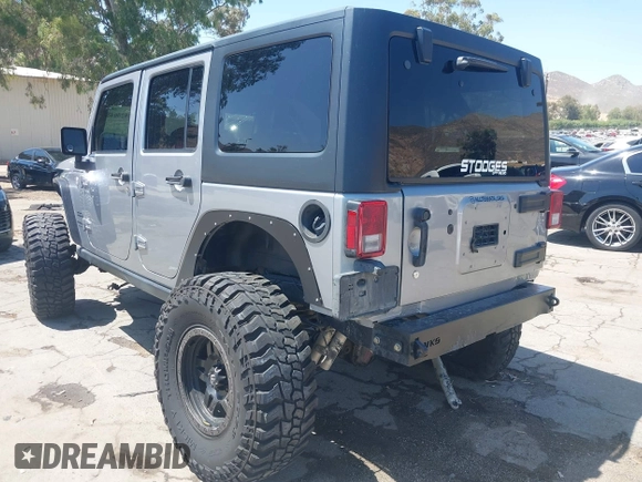 2018 Jeep Wrangler Unlimited Sport with VIN 1C4BJWDG4JL807265, listed as a IAAI auction lot 42520648 with 69,229 mi miles and . Bid and sale history available at DreamBid. Image 3.