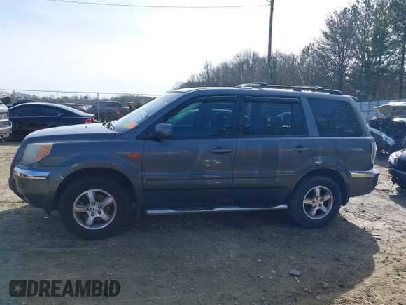 2007 Honda Pilot EX-L with VIN 5FNYF28737B001928, listed as a IAAI auction lot 41311134 with 243,870 mi miles. Bid and sale history available at carsss.com. Image 14.