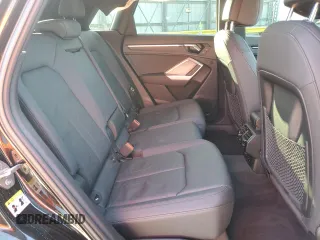2024 Audi Q3 S line Premium z VIN WA1DECF32R1023321, wystawiony jako Copart lot #51187225 z przebiegiem 13 299 mil mil oraz Nie do naprawy. Historia ofert i sprzedaży dostępna na DreamBid. Obrazek 12.