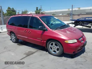 1999 Dodge Caravan ES with VIN 1B4GP74L9XB623426, listed as a IAAI auction lot 42638672 with 196,631 mi miles and . Bid and sale history available at DreamBid. Image 1.