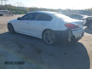 2016 BMW 6 Series 640i xDrive with VIN WBA6D2C51GGT66209, listed as a IAAI auction lot 42064405 with 113,500 mi miles and . Bid and sale history available at carsss.com. Image 3.