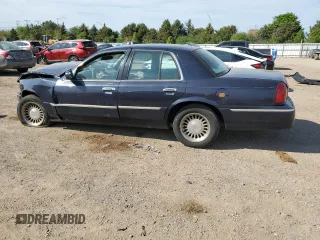1999 Mercury Grand Marquis LS z VIN 2MEFM75W1XX635839, wystawiony jako Copart lot #55860735 z przebiegiem 114 963 mil mil oraz Szkody całkowita. Historia ofert i sprzedaży dostępna na DreamBid. Obrazek 2.