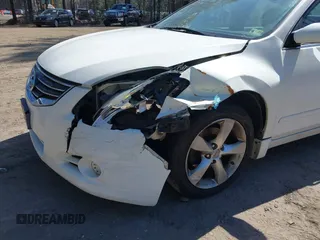 2011 Nissan Altima S with VIN 1N4AL2APXBN465996, listed as a IAAI auction lot 41907608 with 210,702 mi miles and . Bid and sale history available at DreamBid. Image 6.