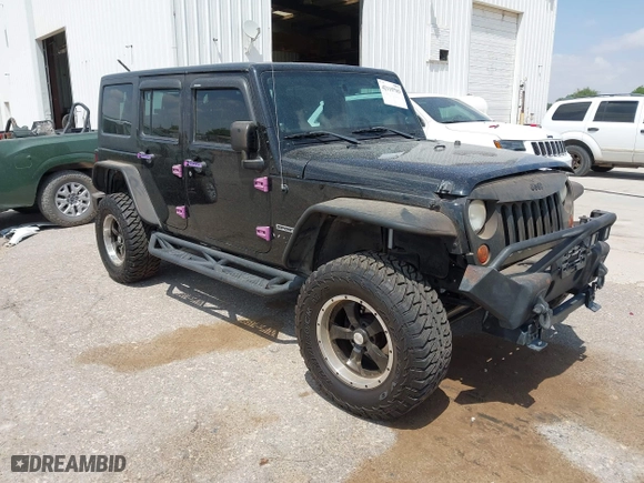 2013 Jeep Wrangler Unlimited Sport with VIN 1C4BJWDG9DL569109, listed as a IAAI auction lot 42115703 with 120,803 mi miles. Bid and sale history available at carsss.com. Image 1.