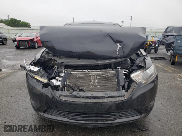 2016 Ford Taurus SEL with VIN 1FAHP2E88GG137607, listed as a Copart auction lot 61356505 with 33,768 mi miles and Salvage title. Bid and sale history available at DreamBid. Image 5.