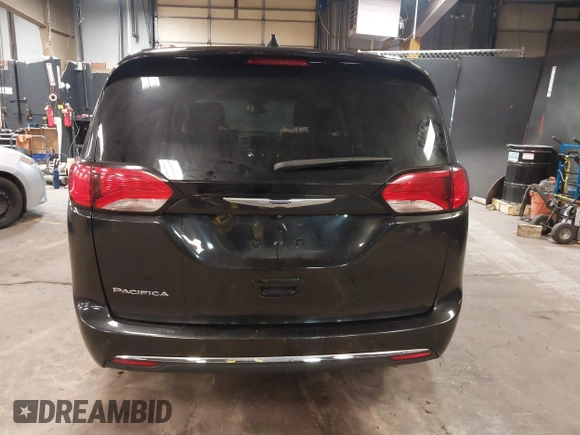 2020 Chrysler Pacifica Touring L with VIN 2C4RC1BG2LR280156, listed as a IAAI auction lot 42182406 with 105,038 mi miles and . Bid and sale history available at DreamBid. Image 16.