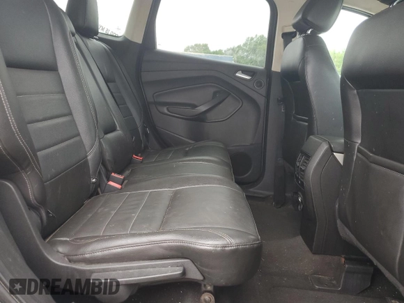 2013 Ford Escape SEL z VIN 1FMCU9HX7DUC11052, wystawiony jako Copart lot #62377515 z przebiegiem 225 704 mil mil oraz Szkoda całkowita • Salvage title. Historia ofert i sprzedaży dostępna na DreamBid. Obrazek 11.