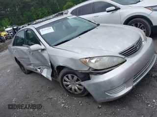 2006 Toyota Camry STD with VIN 4T1BE32K56U702466, listed as a IAAI auction lot 42215660 with 220,464 mi miles and . Bid and sale history available at DreamBid. Image 1.