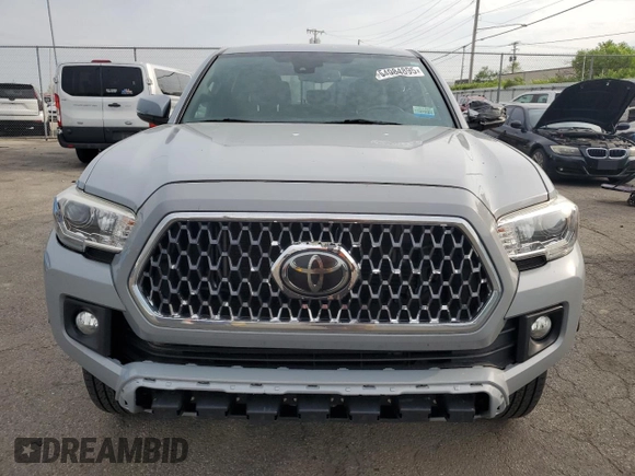 2019 Toyota Tacoma SR z VIN 3TMCZ5AN0KM227229, wystawiony jako Copart lot #54984895 z przebiegiem 244 400 mil mil oraz Czysty tytuł • Clean title. Historia ofert i sprzedaży dostępna na DreamBid. Obrazek 5.