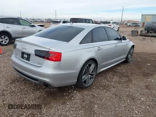 2013 Audi A6 3.0T Prestige with VIN WAUJGAFC8DN015066, listed as a IAAI auction lot 40978422 with 164,992 mi miles. Bid and sale history available at carsss.com. Image 4.