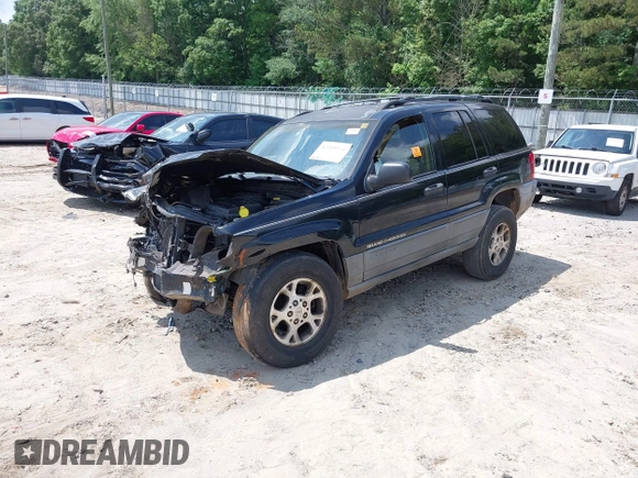 2000 Jeep Grand Cherokee Laredo with VIN 1J4G248SXYC365442, listed as a IAAI auction lot 42285521 with Not provided miles and . Bid and sale history available at DreamBid. Image 2.