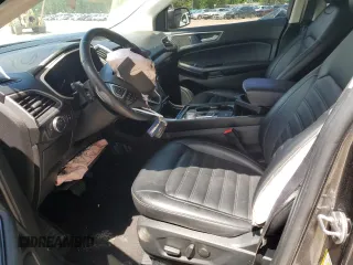 2020 Ford Edge SEL z VIN 2FMPK3J93LBA08227, wystawiony jako Copart lot #57804365 z przebiegiem 57 366 mil mil oraz Szkoda całkowita • Salvage title. Historia ofert i sprzedaży dostępna na DreamBid. Obrazek 7.