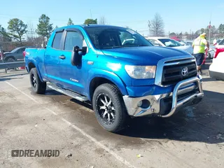 2010 Toyota Tundra z VIN 5TFUW5F11AX143609, wystawiony jako IAAI lot #41498326 z przebiegiem 140 716 mil mil oraz . Historia ofert i sprzedaży dostępna na DreamBid. Obrazek 1.