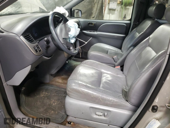 2002 Toyota Sienna LE with VIN 4T3ZF13C02U446097, listed as a Copart auction lot 77127844 with 182,873 mi miles and Salvage Title. Bid and sale history available at carsss.com. Image 7.