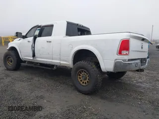 2016 Ram 2500 Laramie with VIN 3C6UR5NL2GG287071, listed as a IAAI auction lot 40989387 with 104,781 mi miles and . Bid and sale history available at DreamBid. Image 3.