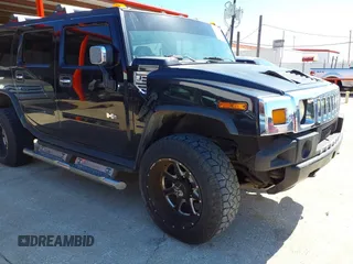 2004 Hummer H2 with VIN 5GRGN23U64H101592, listed as a IAAI auction lot 41379405 with 174,672 mi miles. Bid and sale history available at carsss.com. Image 1.