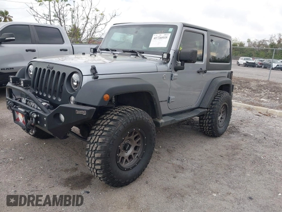 2014 Jeep Wrangler Sport with VIN 1C4AJWAG0EL265409, listed as a IAAI auction lot 41726935 with 78,547 mi miles and . Bid and sale history available at DreamBid. Image 18.