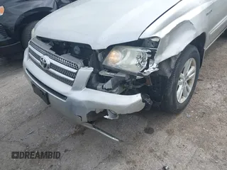 2006 Toyota Highlander z VIN JTEEW21A060020809, wystawiony jako IAAI lot #42147636 z przebiegiem 195 220 mil mil oraz . Historia ofert i sprzedaży dostępna na DreamBid. Obrazek 6.