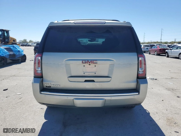 2015 GMC Yukon SLT with VIN 1GKS2BKC4FR100665, listed as a Copart auction lot 48165535 with 138,842 mi miles and Salvage Title. Bid and sale history available at carsss.com. Image 6.