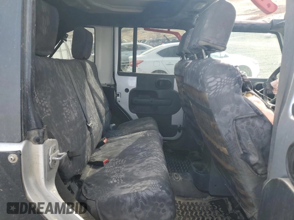 2009 Jeep Wrangler Unlimited Rubicon with VIN 1J8GA69139L703848, listed as a Copart auction lot 43614645 with 172,801 mi miles and Salvage title. Bid and sale history available at DreamBid. Image 10.
