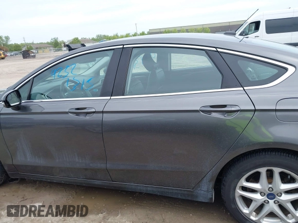 2016 Ford Fusion SE z VIN 3FA6P0HD9GR164473, wystawiony jako IAAI lot #42321315 z przebiegiem 120 005 mil mil oraz . Historia ofert i sprzedaży dostępna na DreamBid. Obrazek 13.