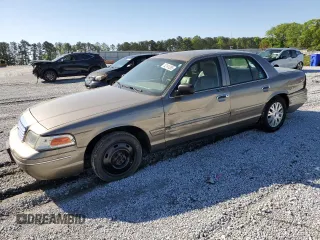 2005 Ford Crown Victoria LX z VIN 2FAFP74WX5X166506, wystawiony jako Copart lot #52141265 z przebiegiem 117 686 mil mil oraz Szkoda całkowita • Salvage title. Historia ofert i sprzedaży dostępna na DreamBid. Obrazek 1.