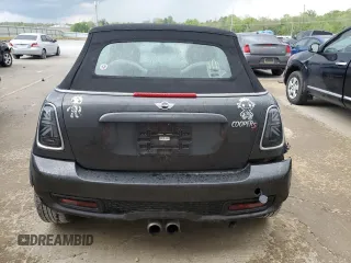 2014 MINI Convertible S with VIN WMWZP3C53ET298154, listed as a Copart auction lot 53971615 with 85,499 mi miles and Salvage title. Bid and sale history available at DreamBid. Image 6.