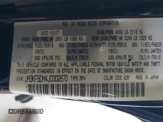2018 Mazda CX-5 Grand Touring with VIN JM3KFBDM4J0302870, listed as a IAAI auction lot 41934217 with 57,151 mi miles. Bid and sale history available at carsss.com. Image 9.