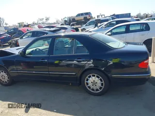 2001 Mercedes-Benz E-Class with VIN WDBJF65J11B368277, listed as a IAAI auction lot 41855716 with 207,864 mi miles. Bid and sale history available at carsss.com. Image 14.