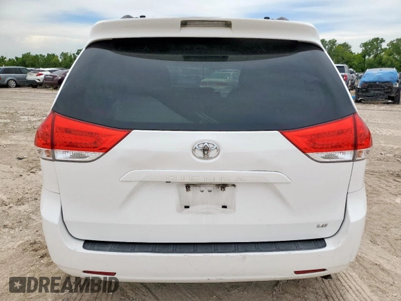 2014 Toyota Sienna LE AAS with VIN 5TDKK3DC1ES424249, listed as a Copart auction lot 62114525 with 193,301 mi miles and Salvage title. Bid and sale history available at DreamBid. Image 6.