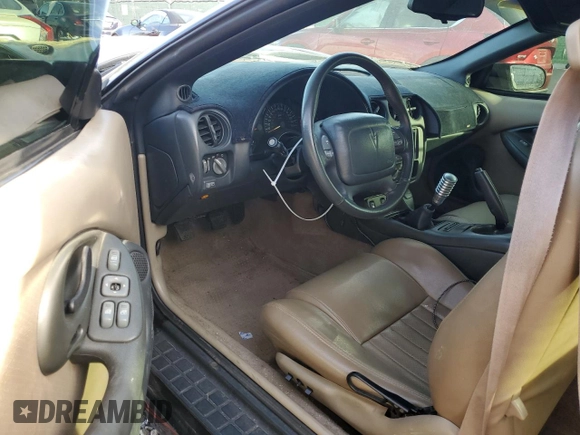 1999 Pontiac Firebird Trans Am with VIN 2G2FV32G1X2217352, listed as a Copart auction lot 79941714 with 174,580 mi miles and Salvage title. Bid and sale history available at DreamBid. Image 8.