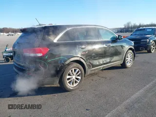 2018 Kia Sorento LX with VIN 5XYPG4A34JG431818, listed as a IAAI auction lot 40997995 with 141,886 mi miles. Bid and sale history available at carsss.com. Image 4.