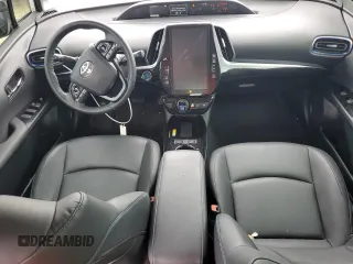 2021 Toyota Prius L Eco с VIN JTDKAMFU5M3142128, выставлен на аукционе Copart как лот 73832324 с пробегом 21 460 миль миль и Списание • Salvage title. История ставок и продаж доступна на DreamBid. Изображение 8.