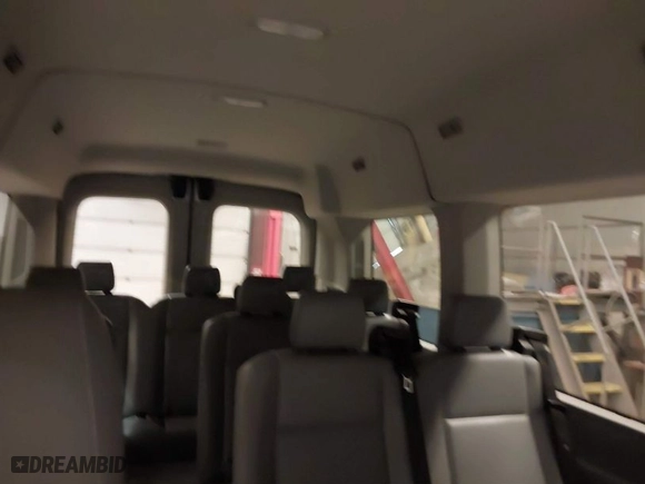 2019 Ford Transit Passenger Wagon XL with VIN 1FMZK1CM8KKA27343, listed as a IAAI auction lot 41607428 with 110,797 mi miles. Bid and sale history available at carsss.com. Image 8.