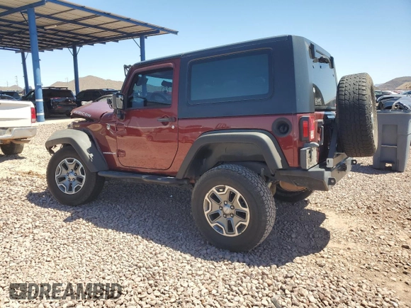 2010 Jeep Wrangler Rubicon with VIN 1J4BA6D14AL167077, listed as a Copart auction lot 54233795 with 148,638 mi miles and Salvage title. Bid and sale history available at DreamBid. Image 2.