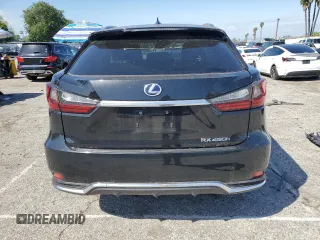 2021 Lexus RX 450h with VIN 2T2HGMDA9MC067213, listed as a Copart auction lot 48599255 with 28,234 mi miles and Salvage title. Bid and sale history available at DreamBid. Image 6.