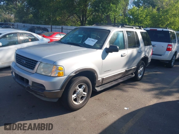 2002 Ford Explorer XLT with VIN 1FMDU73W22UA87874, listed as a IAAI auction lot 42679065 with 210,265 mi miles and . Bid and sale history available at DreamBid. Image 2.