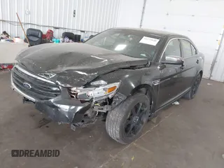 2013 Ford Taurus Limited z VIN 1FAHP2F80DG206445, wystawiony jako IAAI lot #42275040 z przebiegiem 240 502 mil mil oraz . Historia ofert i sprzedaży dostępna na DreamBid. Obrazek 16.