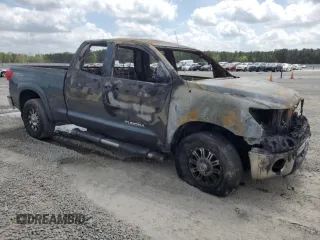2010 Toyota Tundra с VIN 5TFUM5F15AX005061, выставлен на аукционе Copart как лот 51823565 с пробегом Не указан миль и Списание • Salvage title. История ставок и продаж доступна на DreamBid. Изображение 4.
