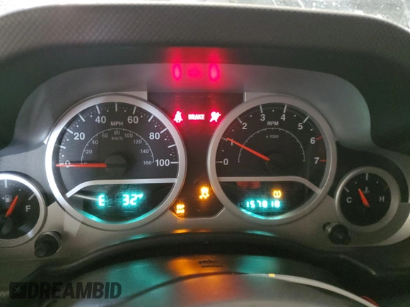 2009 Jeep Wrangler Unlimited Rubicon with VIN 1J8GA69179L756441, listed as a Copart auction lot 52111435 with 157,818 mi miles and Salvage title. Bid and sale history available at DreamBid. Image 9.