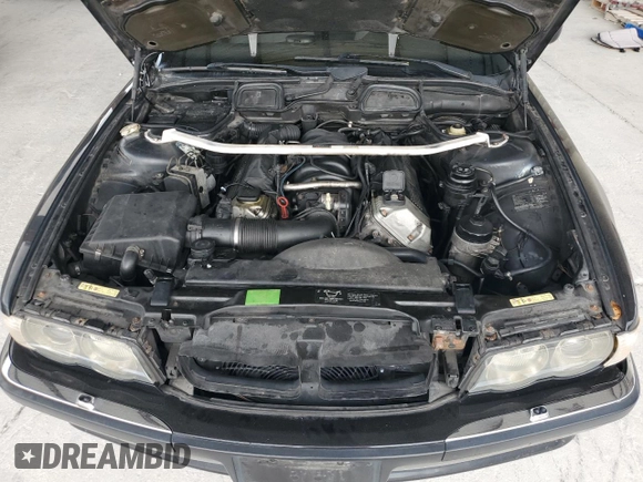 2001 BMW 7 Series 740i с VIN WBAGG83441DN86975, выставлен на аукционе Copart как лот 52218605 с пробегом 193 846 миль миль и Чистый • Clean title. История ставок и продаж доступна на DreamBid. Изображение 11.